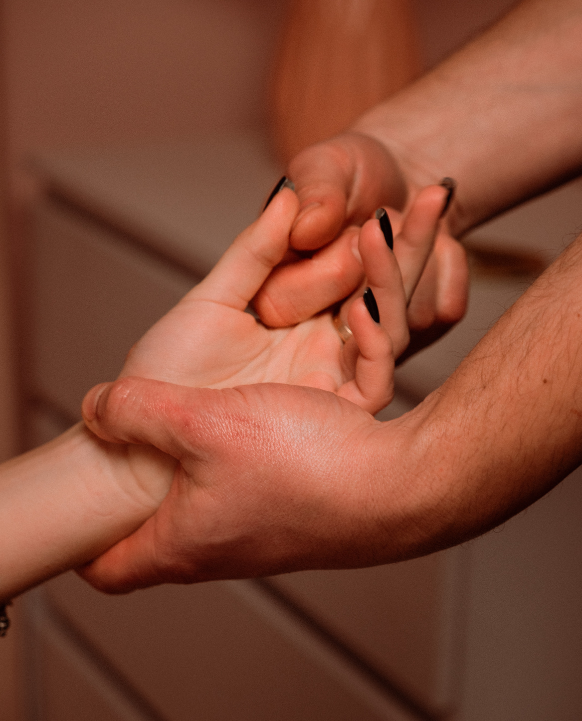A Person Massaging a Hand